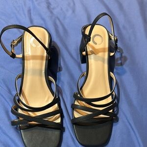 Beautiful black sandals. New. Never worn outside
